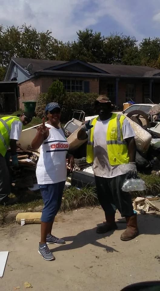 Outreach volunteers helping in a neighborhood